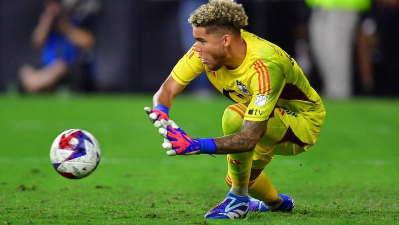 Oct 4, 2023; Los Angeles, California, USA; Minnesota United goalkeeper Dayne St. Clair (97) stops a shot against Los Angeles FC during the second half at BMO Stadium. Mandatory Credit: Gary A. Vasquez-USA TODAY Sports