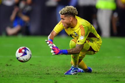 Oct 4, 2023; Los Angeles, California, USA; Minnesota United goalkeeper Dayne St. Clair (97) stops a shot against Los Angeles FC during the second half at BMO Stadium. Mandatory Credit: Gary A. Vasquez-USA TODAY Sports