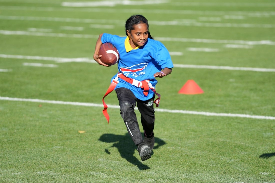 Oct 6, 2023; Watford, United Kingdom; Girls participate in a NFL Flag football event at The Grove Hotel. Mandatory Credit: Kirby Lee-USA TODAY Sports