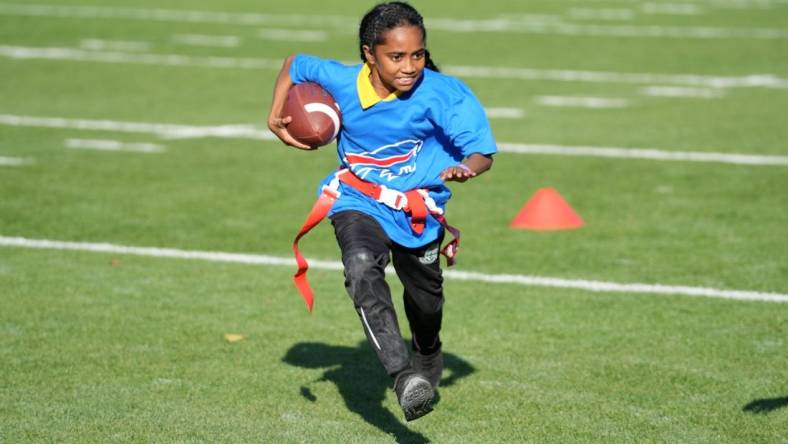 Oct 6, 2023; Watford, United Kingdom; Girls participate in a NFL Flag football event at The Grove Hotel. Mandatory Credit: Kirby Lee-USA TODAY Sports