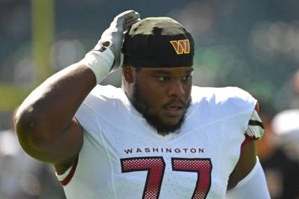 Oct 1, 2023; Philadelphia, Pennsylvania, USA; Washington Commanders offensive tackle Saahdiq Charles (77) against the Philadelphia Eagles at Lincoln Financial Field. Mandatory Credit: Eric Hartline-USA TODAY Sports