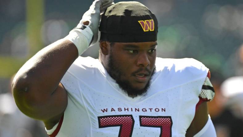 Oct 1, 2023; Philadelphia, Pennsylvania, USA; Washington Commanders offensive tackle Saahdiq Charles (77) against the Philadelphia Eagles at Lincoln Financial Field. Mandatory Credit: Eric Hartline-USA TODAY Sports