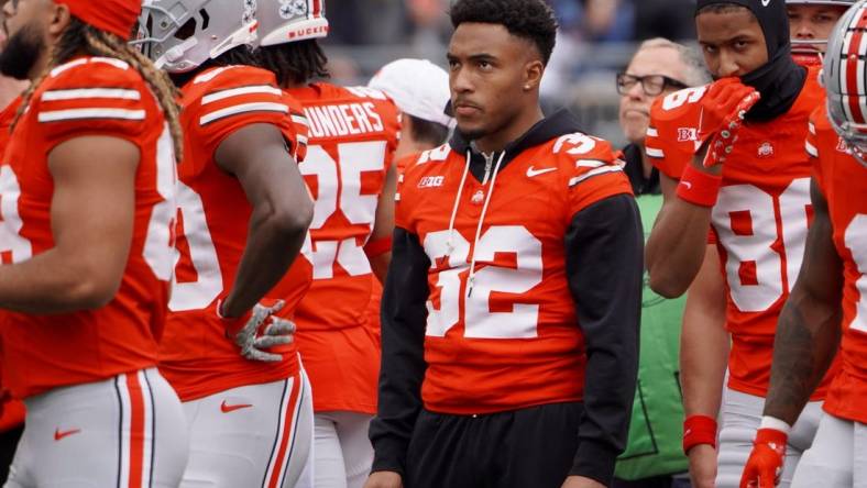 Ohio State running back TreVeyon Henderson watches warmups before the Buckeyes game against Maryland at Ohio Stadium on Oct. 7, 2023.