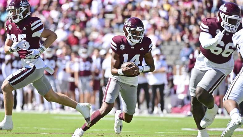 Oct 7, 2023; Starkville, Mississippi, USA; Mississippi State Bulldogs quarterback Mike Wright (14) runs the ball against the Western Michigan Broncos during the first quarter at Davis Wade Stadium at Scott Field. Mandatory Credit: Matt Bush-USA TODAY Sports