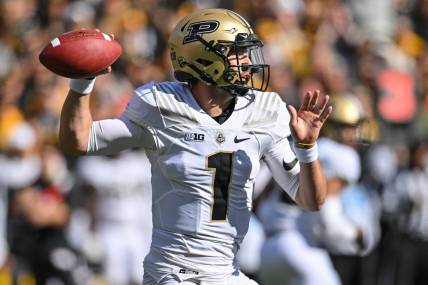 Oct 7, 2023; Iowa City, Iowa, USA; Purdue Boilermakers quarterback Hudson Card (1) throws a pass against the Iowa Hawkeyes during the first quarter at Kinnick Stadium. Mandatory Credit: Jeffrey Becker-USA TODAY Sports