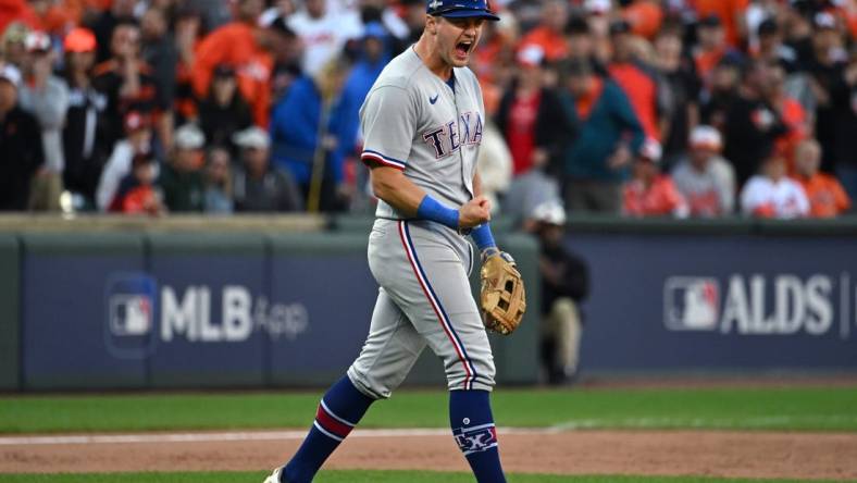 Oct 7, 2023; Baltimore, Maryland, USA; Texas Rangers third baseman Josh Jung (6) celebrates after the Rangers defeated the Baltimore Orioles in game one of the ALDS for the 2023 MLB playoffs at Oriole Park at Camden Yards. Mandatory Credit: Tommy Gilligan-USA TODAY Sports