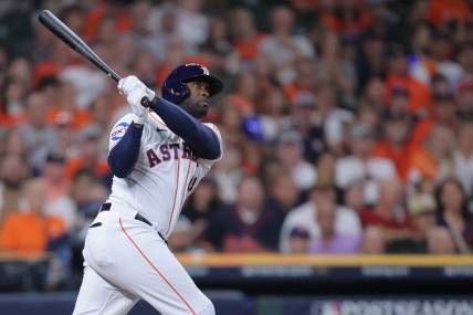 Oct 7, 2023; Houston, Texas, USA; Houston Astros left fielder Yordan Alvarez (44) hits a home-run in the seventh inning against the Minnesota Twins during game one of the ALDS for the 2023 MLB playoffs at Minute Maid Park. Mandatory Credit: Erik Williams-USA TODAY Sports
