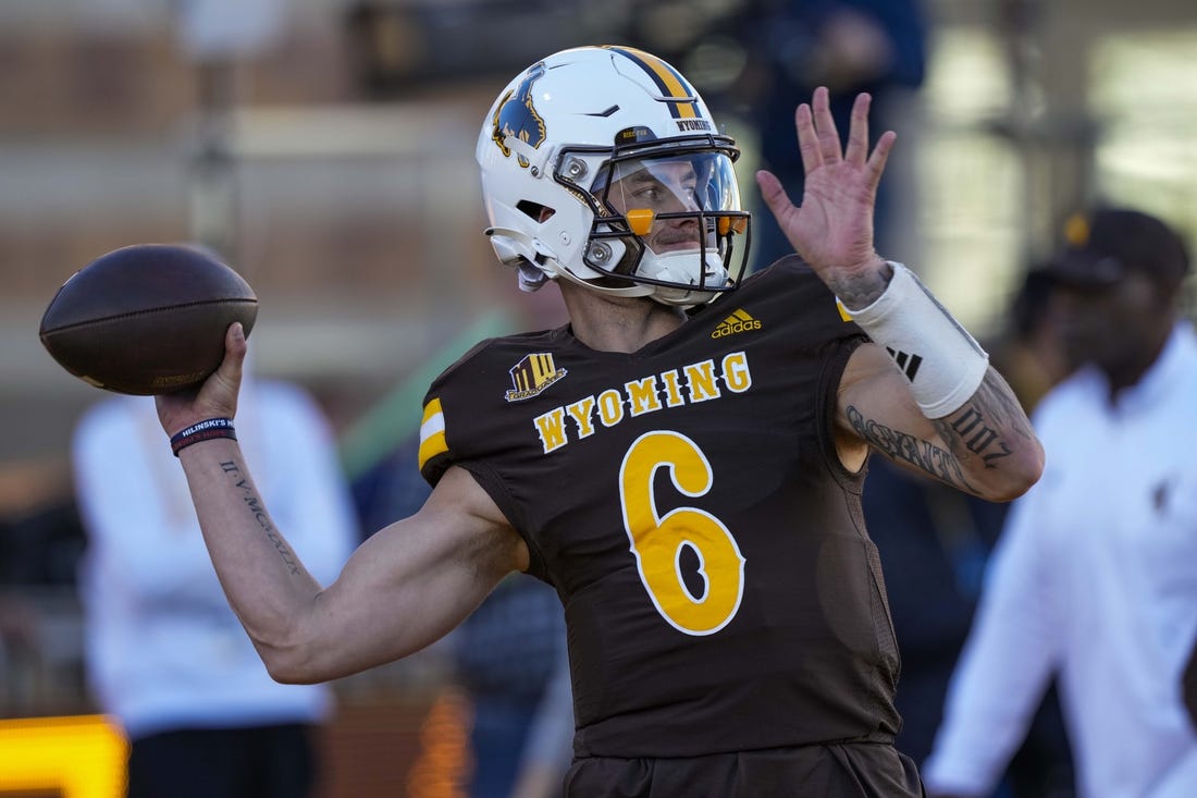 Oct 7, 2023; Laramie, Wyoming, USA; Wyoming Cowboys quarterback Andrew Peasley (6) warms up before game against the Fresno State Bulldogs at Jonah Field at War Memorial Stadium. Mandatory Credit: Troy Babbitt-USA TODAY Sports