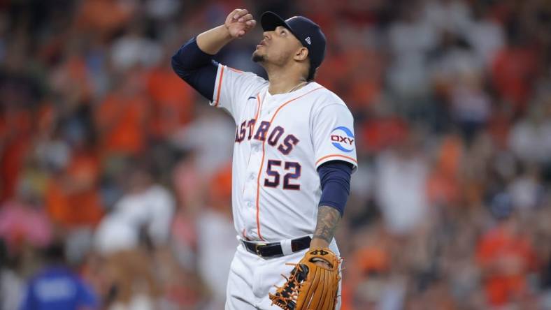 Oct 7, 2023; Houston, Texas, USA; Houston Astros relief pitcher Bryan Abreu (52) looks on in the eighth inning against the Minnesota Twins during game one of the ALDS for the 2023 MLB playoffs at Minute Maid Park. Mandatory Credit: Erik Williams-USA TODAY Sports