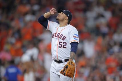 Oct 7, 2023; Houston, Texas, USA; Houston Astros relief pitcher Bryan Abreu (52) looks on in the eighth inning against the Minnesota Twins during game one of the ALDS for the 2023 MLB playoffs at Minute Maid Park. Mandatory Credit: Erik Williams-USA TODAY Sports