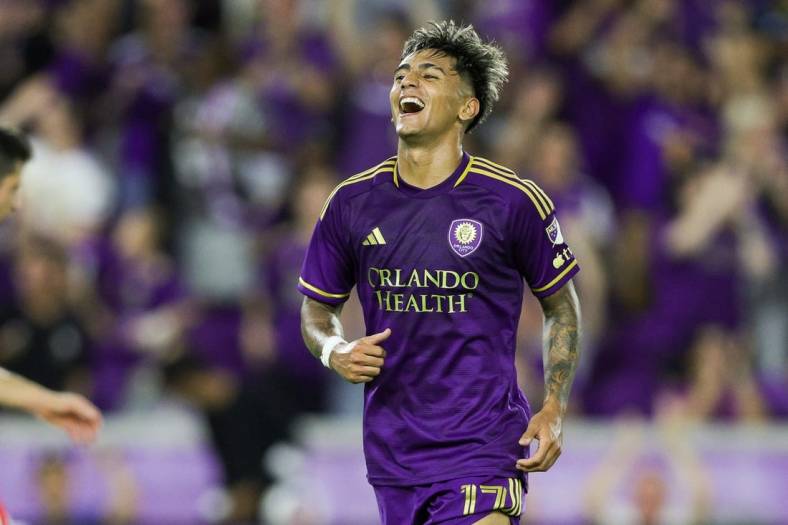 Oct 7, 2023; Orlando, Florida, USA;  Orlando City SC forward Facundo Torres (17) celebrates after scoring a goal against the New England Revolution in the first half at Exploria Stadium. Mandatory Credit: Nathan Ray Seebeck-USA TODAY Sports