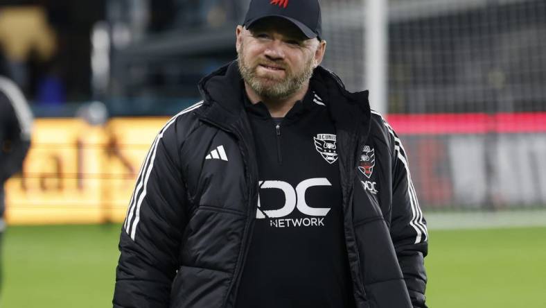 Oct 7, 2023; Washington, District of Columbia, USA; D.C. United head coach Wayne Rooney walks onto the pitch prior to the match against New York City FC at Audi Field. Mandatory Credit: Geoff Burke-USA TODAY Sports