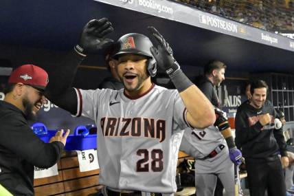 Oct 7, 2023; Los Angeles, California, USA; Arizona Diamondbacks left fielder Tommy Pham (28) reacts in the dug out against the Los Angeles Dodgers during the eighth inning for game one of the NLDS for the 2023 MLB playoffs at Dodger Stadium. Mandatory Credit: Jayne Kamin-Oncea-USA TODAY Sports
