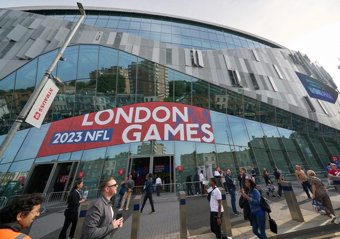 Oct 8, 2023; London, United Kingdom; Fans outside the stadium before the first half of an NFL International Series game at Tottenham Hotspur Stadium. Mandatory Credit: Peter van den Berg-USA TODAY Sports