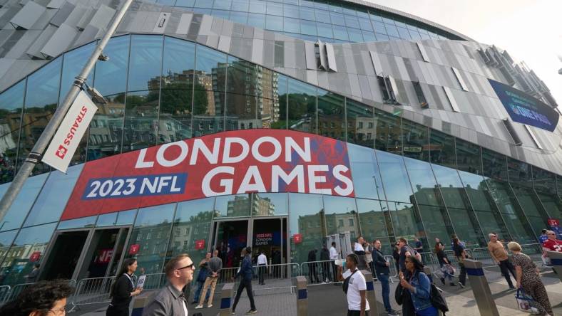 Oct 8, 2023; London, United Kingdom; Fans outside the stadium before the first half of an NFL International Series game at Tottenham Hotspur Stadium. Mandatory Credit: Peter van den Berg-USA TODAY Sports