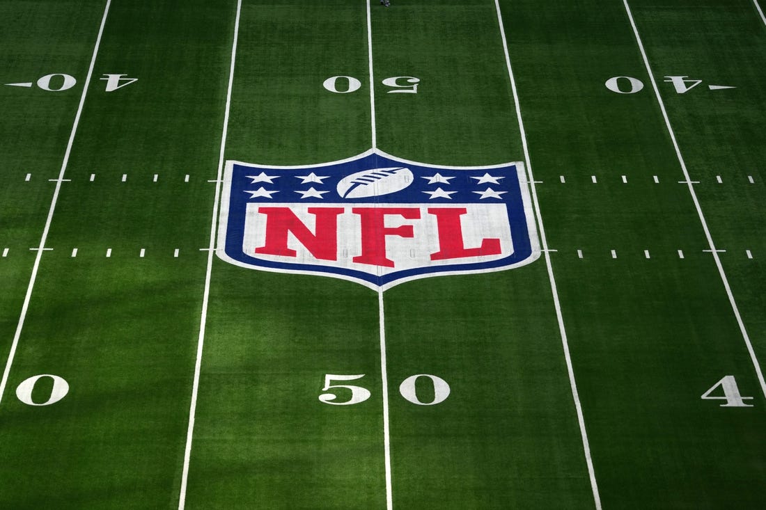 Oct 8, 2023; London United Kingdom, The NFL Shield logo at midfield at Tottenham Hotspur Stadium. Mandatory Credit: Kirby Lee-USA TODAY Sports