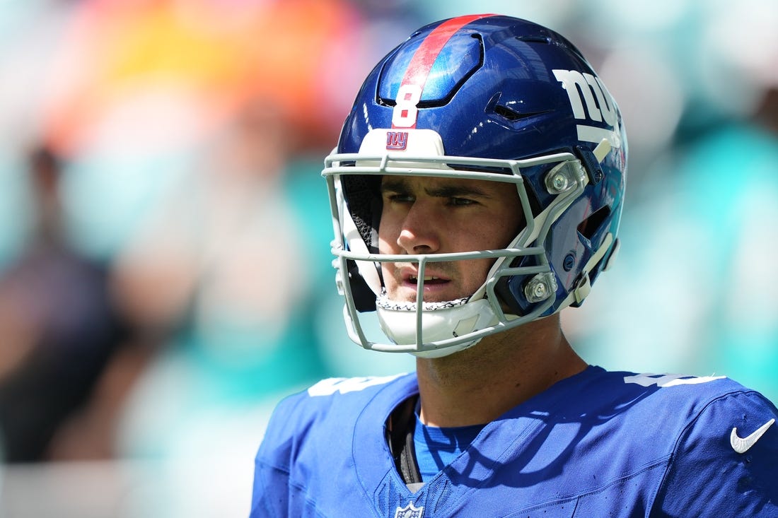 Oct 8, 2023; Miami Gardens, Florida, USA; New York Giants quarterback Daniel Jones (8) walks onto the field prior to the game against the New York Giants at Hard Rock Stadium. Mandatory Credit: Jasen Vinlove-USA TODAY Sports