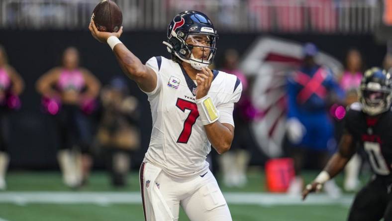 Oct 8, 2023; Atlanta, Georgia, USA; Houston Texans quarterback C.J. Stroud (7) passes against the Atlanta Falcons during the first half at Mercedes-Benz Stadium. Mandatory Credit: Dale Zanine-USA TODAY Sports