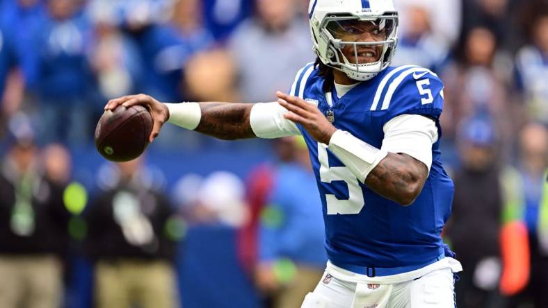 Oct 8, 2023; Indianapolis, Indiana, USA; Indianapolis Colts quarterback Anthony Richardson (5) throws a pass during the first quarter against the Tennessee Titans at Lucas Oil Stadium. Mandatory Credit: Marc Lebryk-USA TODAY Sports