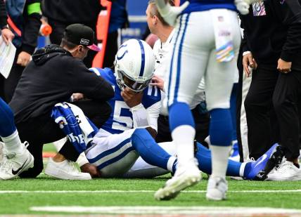 Oct 8, 2023; Indianapolis, Indiana, USA; Indianapolis Colts quarterback Anthony Richardson (5) sits on the field with a shoulder injury during the second quarter against the Tennessee Titans at Lucas Oil Stadium. Mandatory Credit: Marc Lebryk-USA TODAY Sports