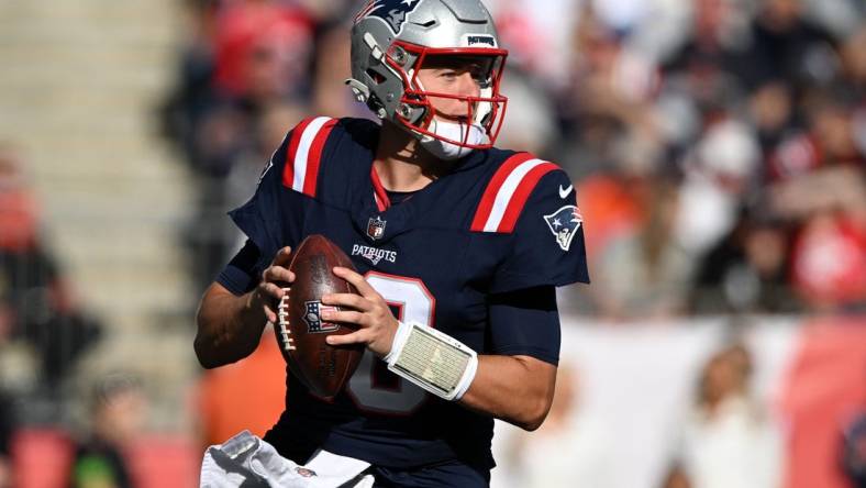 Oct 8, 2023; Foxborough, Massachusetts, USA; New England Patriots quarterback Mac Jones (10) looks to pass against the New Orleans Saints during the second half at Gillette Stadium. Mandatory Credit: Brian Fluharty-USA TODAY Sports