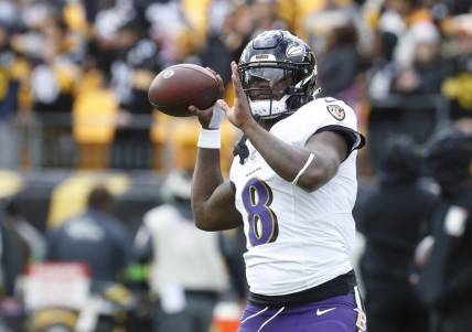 Oct 8, 2023; Pittsburgh, Pennsylvania, USA; Baltimore Ravens quarterback Lamar Jackson (8) warms up before the game against the Pittsburgh Steelers at Acrisure Stadium. Mandatory Credit: Charles LeClaire-USA TODAY Sports