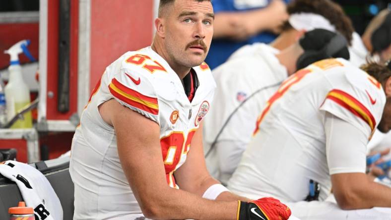 Oct 8, 2023; Minneapolis, Minnesota, USA; Kansas City Chiefs tight end Travis Kelce (87) looks on from the bench against the Minnesota Vikings during the second quarter at U.S. Bank Stadium. Mandatory Credit: Jeffrey Becker-USA TODAY Sports