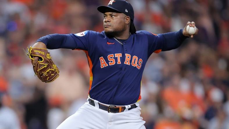 Oct 8, 2023; Houston, Texas, USA; Houston Astros starting pitcher Framber Valdez (59) throws a pitch in the first inning for game two of the ALDS for the 2023 MLB playoffs against the Minnesota Twins at Minute Maid Park. Mandatory Credit: Erik Williams-USA TODAY Sports