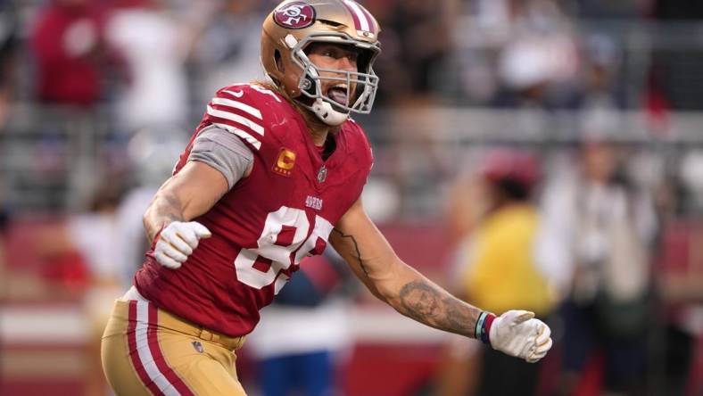 Oct 8, 2023; Santa Clara, California, USA; San Francisco 49ers tight end George Kittle (85) reacts after scoring a touchdown against the Dallas Cowboys during the second quarter at Levi's Stadium. Mandatory Credit: Darren Yamashita-USA TODAY Sports