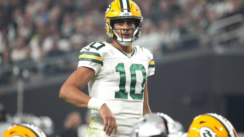 Oct 9, 2023; Paradise, Nevada, USA; Green Bay Packers quarterback Jordan Love (10) prepares to take the snap against the Las Vegas Raiders in the second half at Allegiant Stadium. Mandatory Credit: Kirby Lee-USA TODAY Sports