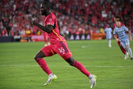 Sep 30, 2023; St. Louis, Missouri, USA; St. Louis City forward Samuel Adeniran (16) runs against Sporting Kansas City in the second half at CITYPARK. Mandatory Credit: Joe Puetz-USA TODAY Sports