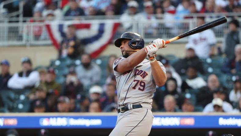 Oct 10, 2023; Minneapolis, Minnesota, USA; Houston Astros first baseman Jose Abreu (79) hits a two-run home-run in the ninth inning against the Minnesota Twins during game three of the ALDS for the 2023 MLB playoffs at Target Field. Mandatory Credit: Jesse Johnson-USA TODAY Sports