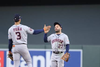 Oct 10, 2023; Minneapolis, Minnesota, USA; Houston Astros second baseman Jose Altuve (27) and shortstop Jeremy Pena (3) celebrates defeating Minnesota Twins  during game three of the ALDS for the 2023 MLB playoffs at Target Field. Mandatory Credit: Jesse Johnson-USA TODAY Sports
