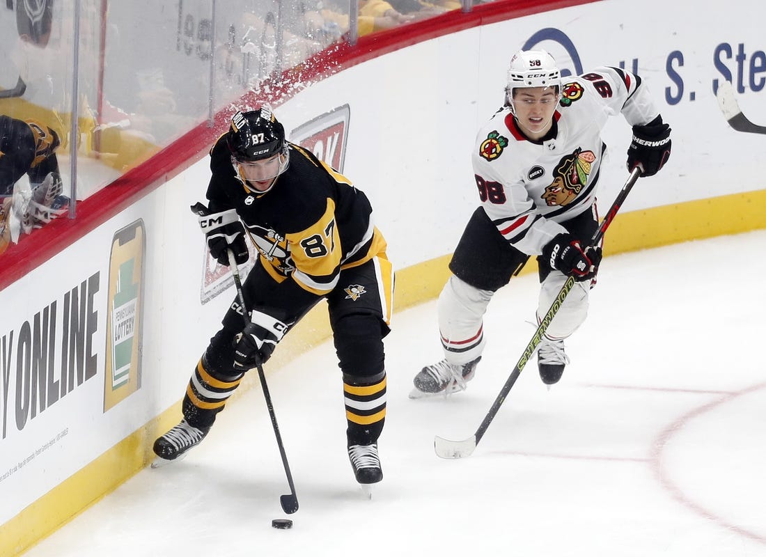 Bedard has assist in NHL debut, Blackhawks beat Crosby, Penguins 4