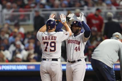 Oct 11, 2023; Minneapolis, Minnesota, USA; Houston Astros first baseman Jose Abreu (79) celebrates hitting a two-run home-run with left fielder Yordan Alvarez (44) in the fourth inning against the Minnesota Twins during game four of the ALDS for the 2023 MLB playoffs at Target Field. Mandatory Credit: Jesse Johnson-USA TODAY Sports