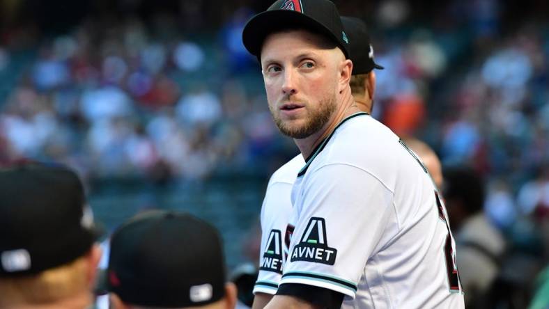 Oct 11, 2023; Phoenix, Arizona, USA; Arizona Diamondbacks starting pitcher Merrill Kelly (29) before game three of the NLDS for the 2023 MLB playoffs against the Los Angeles Dodgers at Chase Field. Mandatory Credit: Matt Kartozian-USA TODAY Sports