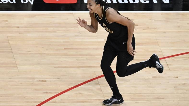 Oct 11, 2023; Las Vegas, Nevada, USA; Las Vegas Aces center Kiah Stokes (41) celebrates hitting a 3-point shot in the first half of the game against the New York Liberty during game two of the 2023 WNBA Finals at Michelob Ultra Arena. Mandatory Credit: Candice Ward-USA TODAY Sports