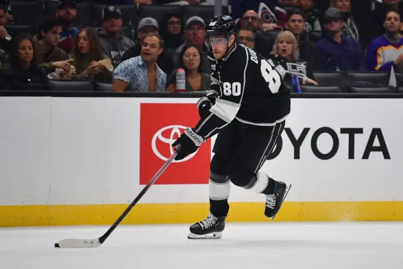 Oct 11, 2023; Los Angeles, California, USA; Los Angeles Kings left wing Pierre-Luc Dubois (80) moves the puck against the Colorado Avalanche during the second period at Crypto.com Arena. Mandatory Credit: Gary A. Vasquez-USA TODAY Sports
