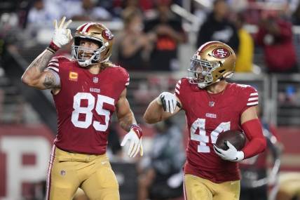 Oct 8, 2023; Santa Clara, California, USA; San Francisco 49ers tight end George Kittle (85) gestures with fullback Kyle Juszczyk (44) after scoring a touchdown against the Dallas Cowboys during the third quarter at Levi's Stadium. Mandatory Credit: Darren Yamashita-USA TODAY Sports