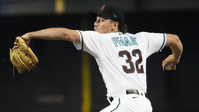 Arizona Diamondbacks starting pitcher Brandon Pfaadt (32) throws to the Los Angeles Dodgers in the first inning during Game 3 of the NLDS at Chase Field in Phoenix on Oct. 11, 2023.