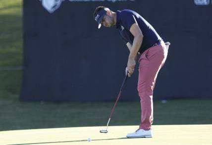 Oct 12, 2023; Las Vegas, Nevada, USA; Beau Hossler putts for birdie on the eighteenth green during the first round of the Shriners Children's Open golf tournament at TPC Summerlin. Mandatory Credit: Ray Acevedo-USA TODAY Sports