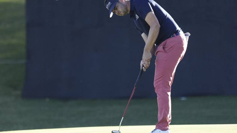 Oct 12, 2023; Las Vegas, Nevada, USA; Beau Hossler putts for birdie on the eighteenth green during the first round of the Shriners Children's Open golf tournament at TPC Summerlin. Mandatory Credit: Ray Acevedo-USA TODAY Sports