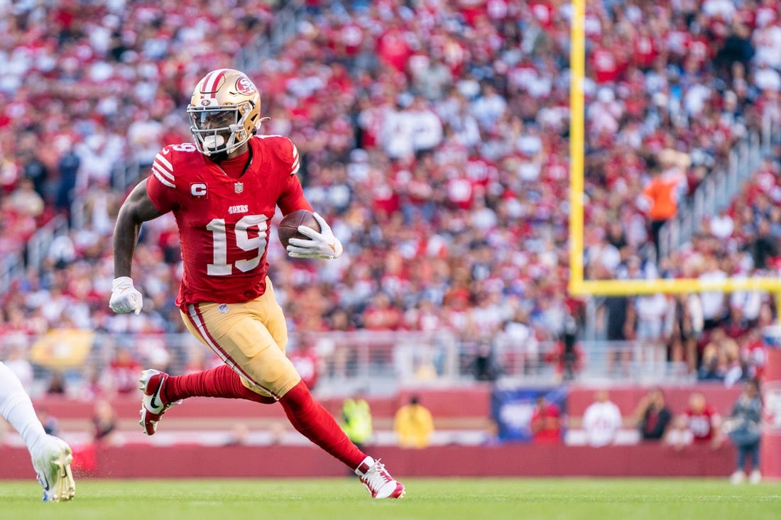 October 8, 2023; Santa Clara, California, USA; San Francisco 49ers wide receiver Deebo Samuel (19) runs the football during the first quarter against the Dallas Cowboys at Levi's Stadium. Mandatory Credit: Kyle Terada-USA TODAY Sports