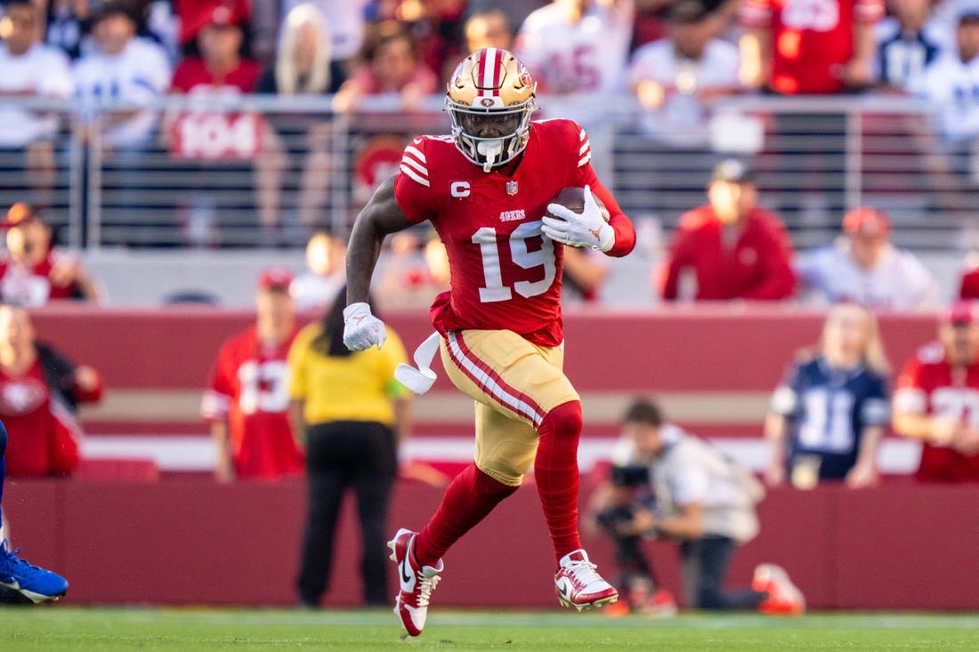 October 8, 2023; Santa Clara, California, USA; San Francisco 49ers wide receiver Deebo Samuel (19) runs the football against the Dallas Cowboys during the first quarter at Levi's Stadium. Mandatory Credit: Kyle Terada-USA TODAY Sports