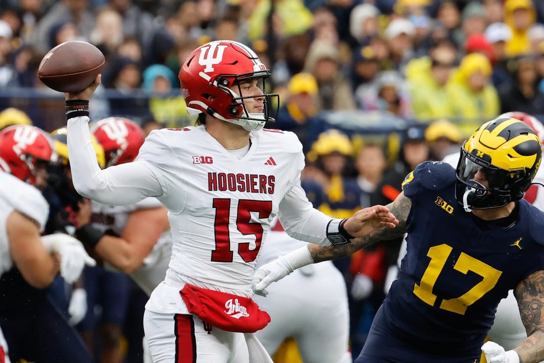 Oct 14, 2023; Ann Arbor, Michigan, USA; Indiana Hoosiers quarterback Brendan Sorsby (15) passes in the first half against the Michigan Wolverines at Michigan Stadium. Mandatory Credit: Rick Osentoski-USA TODAY Sports