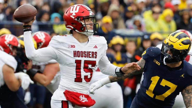 Oct 14, 2023; Ann Arbor, Michigan, USA; Indiana Hoosiers quarterback Brendan Sorsby (15) passes in the first half against the Michigan Wolverines at Michigan Stadium. Mandatory Credit: Rick Osentoski-USA TODAY Sports