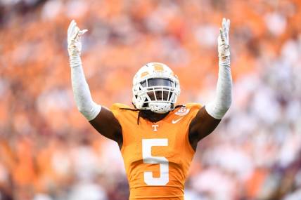 Oct 14, 2023; Knoxville, TN, USA; Tennessee defensive back Kamal Hadden (5) raises his hands in the air during a football game between Tennessee and Texas A&M at Neyland Stadium in Knoxville, Tenn., on Saturday, Oct. 14, 2023. Mandatory Credit: Saul Young-USA TODAY Sports