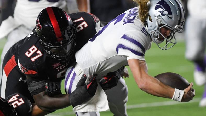 Kansas State's quarterback Avery Johnson (5) scores a touchdown against Texas Tech in a Big 12 conference football game, Saturday, Oct. 14, 2023, at Jones AT&T Stadium.