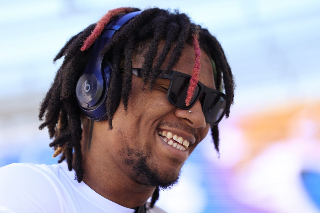 Indianapolis Colts quarterback Anthony Richardson (5) smiles while signing autographs before an NFL football matchup against the Jacksonville Jaguars Sunday, Oct. 15, 2023 at EverBank Stadium in Jacksonville, Fla. Richardson is on injured reserve after suffering a shoulder injury in week 5 against the Tennessee Titans. [Corey Perrine/Florida Times-Union]