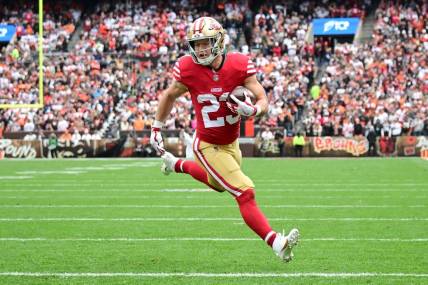 Oct 15, 2023; Cleveland, Ohio, USA; San Francisco 49ers running back Christian McCaffrey (23) scores a touchdown during the first half against the Cleveland Browns at Cleveland Browns Stadium. Mandatory Credit: Ken Blaze-USA TODAY Sports